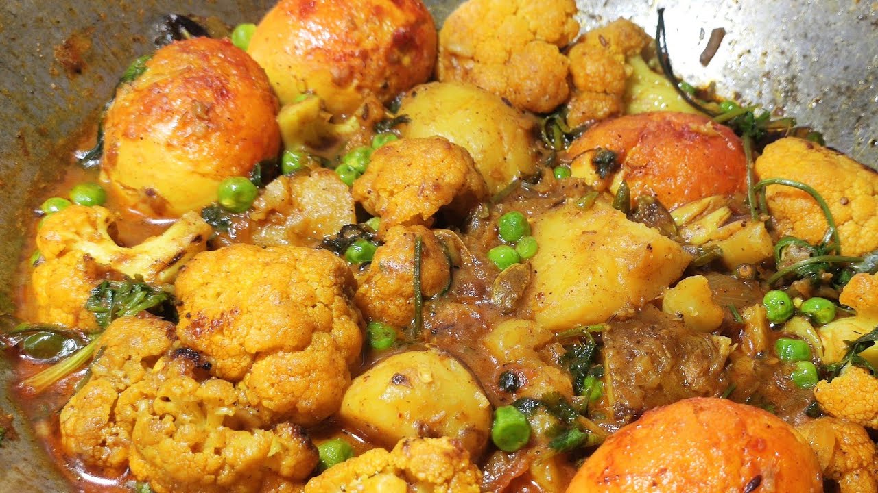 Tasty cooking.Eggs potato coliflowers roast recipe . ডিম ফুলকপি রোষ্ট। খুব ই ভালো খেতে হয়।