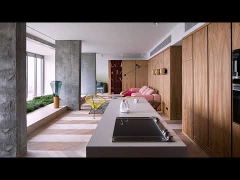Wood Covered Industrial Interior Accented With 1940’s Inspired Palette