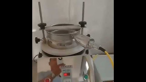 Ultrasonic sieve shaker sieves graphite powder