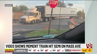 Video shows moment train hit semi on Mass Ave
