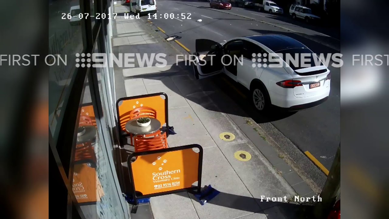 Tesla Model X Door Torn Off By Passing Truck