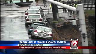 Sinkhole swallows cars in Baltimore