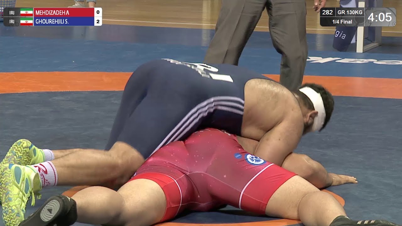 1/4 GR - 130 kg: B. MEHDIZADEH A (IRI) v. S. GHOUREHJILI (IRI)