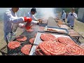 Italy Street Food. Extreme Grill of Ribs, Sausages and Chicken, Filled Burritos, Tacos and more Food