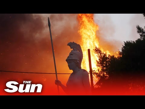 Greece wildfires - Out of control blaze sees residents flee by boat as villages are destroyed