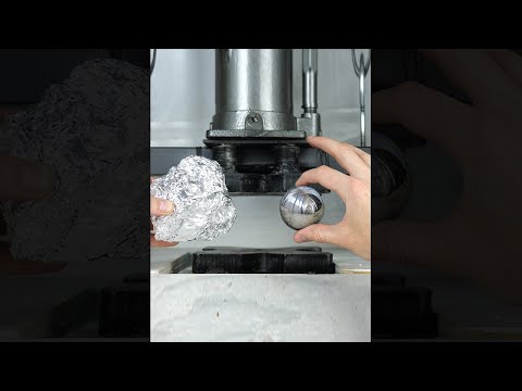 Mirror-Polished Japanese Foil Ball Crushed in Hydraulic Press