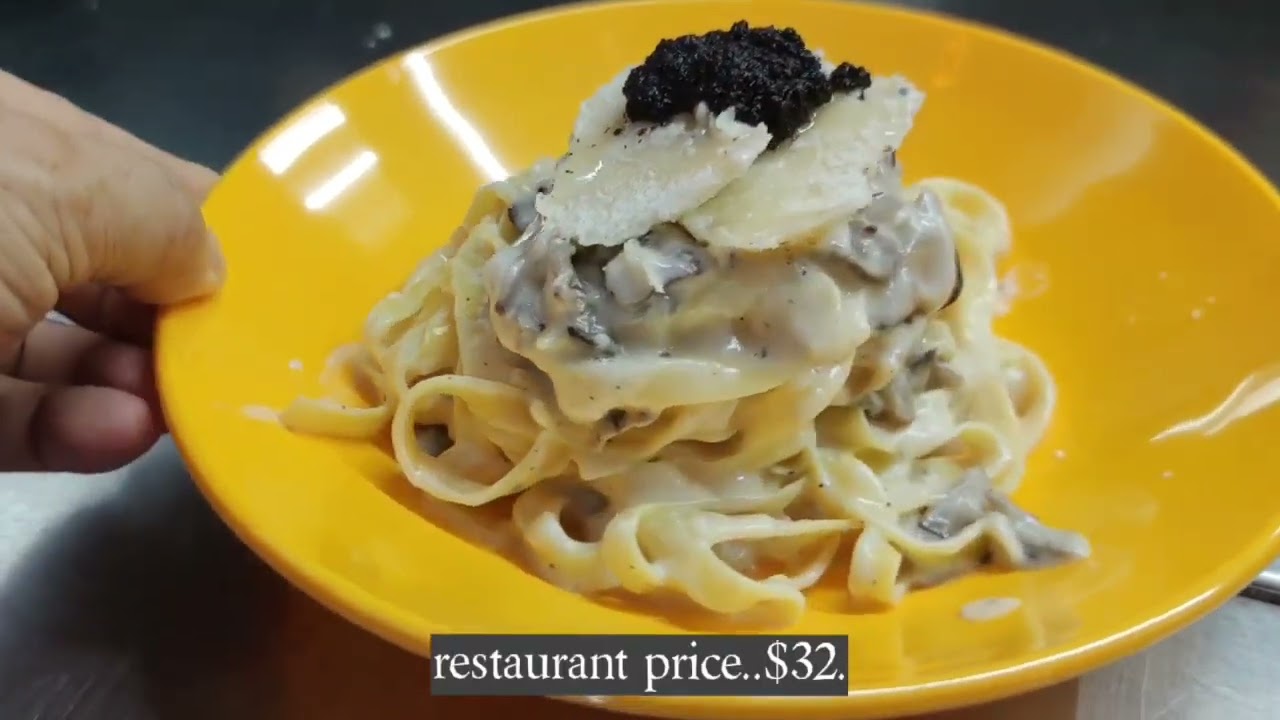 First Muslim-Friendly Hawker Serving Parmesan Cheesewheel Truffle Pasta in $700 Parmesan Cheesewheel