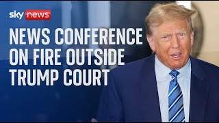 News conference on the fire outside Trump court