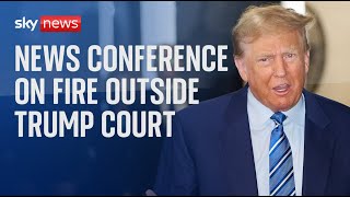 Live of news conference on the fire outside Trump court