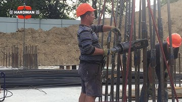 Splicing of the reinforcement bars  #28 and #32. Construction site