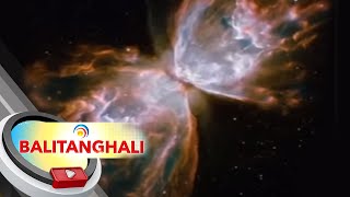 Nakunang larawan ng NASA sa outer space, tila hugis paruparo at nagliliwanag ng kulay pula | BT screenshot 1