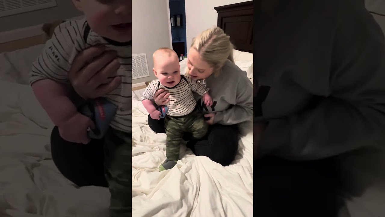 Cute momma and lovely baby playing. 