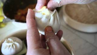 Folding Baozi from The Woks of Life