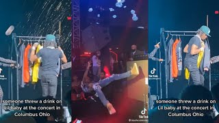 Lil Baby gets a drink thrown at him on at a show in SC and Blueface falls off stage in Dubai