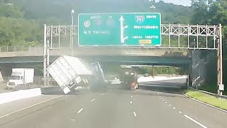 Video shows tractor-trailer overturn in alleged road rage crash Resimi