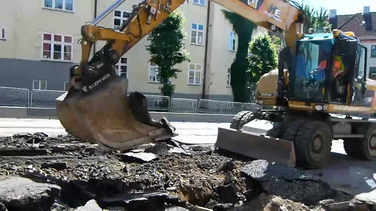 Cat M316D Wheeled Excavator Ripping Asphalt - YouTube