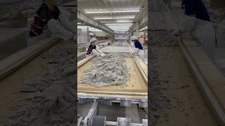 Quartz slabs are created by mixing natural quartz crystals with resin and pigments.