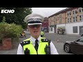 Doors put through and CHILDREN led away as POLICE SWARM Merseyside