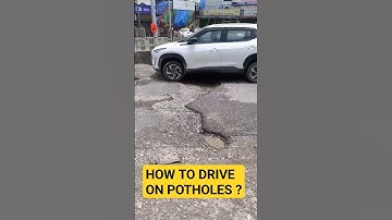 HOW TO DRIVE ON POTHOLES ? 🚔 🔥#shorts #viralshorts