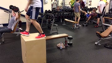 Kneeling jump to hurdle jump to rotational box jump