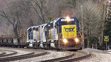 CSX EMD Power w/ Road Slug Hauling Railroad Rails