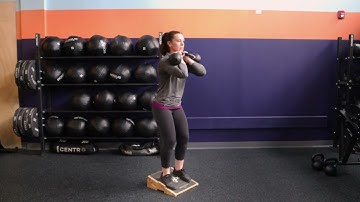 Dual Kettlebell Front Rack Cyclist Squat