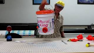 Easy chicken feeder made from a 5 gallon bucket with a lid