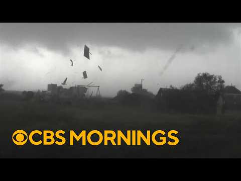 Debris flies across central Kansas as storms slam Plains