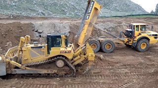 Volvo A45G Articulated Haulers Dumping Rock - D8T Dozer Pushing