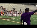 Pine Bluffs players, coaches and fans celebrate the Hornets' victory.