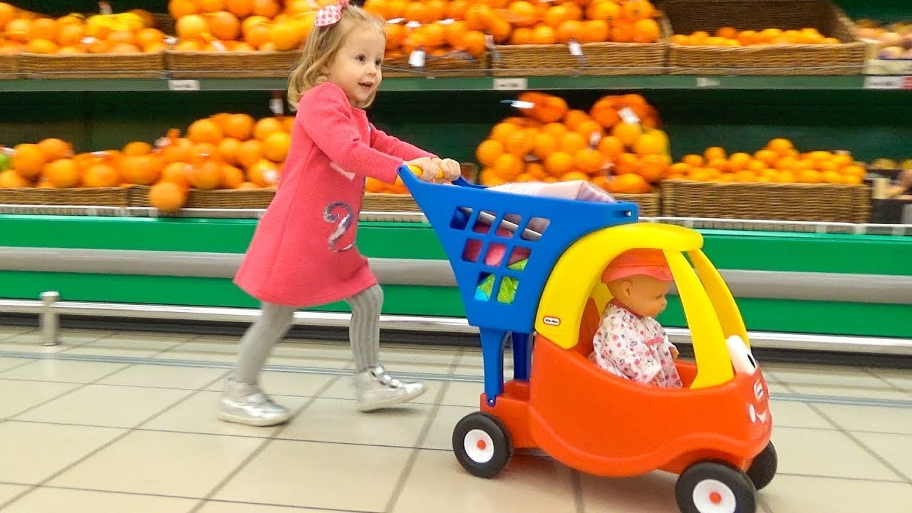 Funny Kid and Baby Doll Lola doing shopping