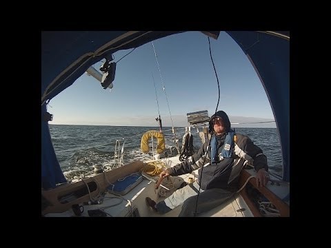 Sailing in the dark and 3 shipping vessels approaching