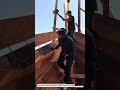 Manual Alignment &amp; Installation of Large Wooden Form Panels Using Chain Hoist.