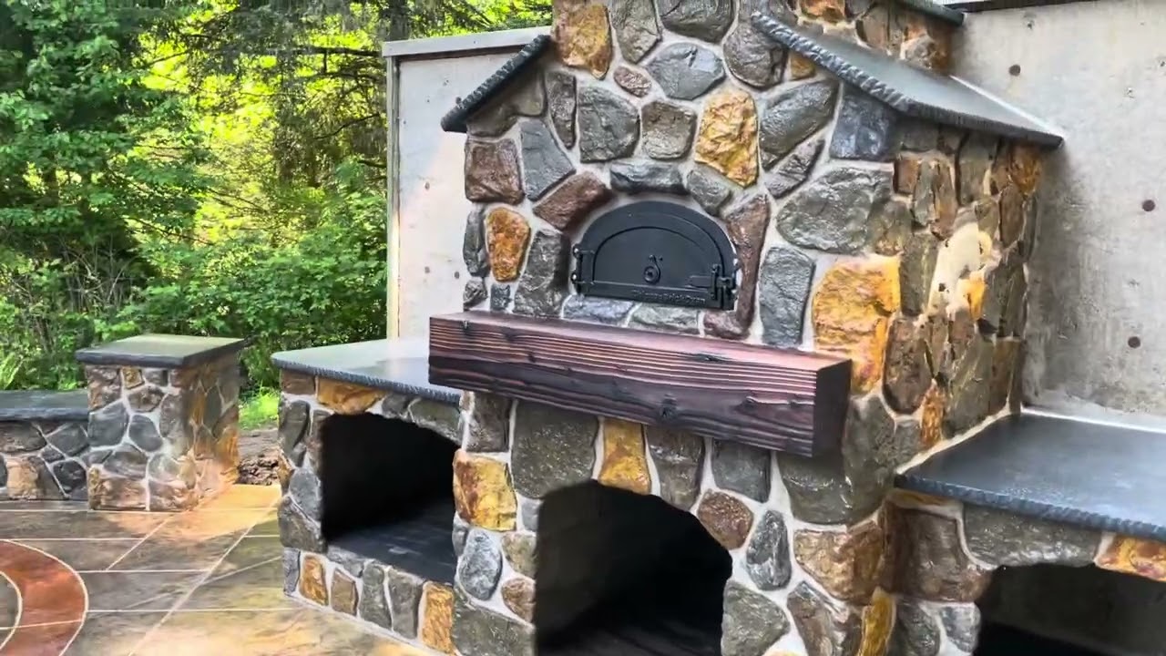 Outdoor kitchen, fireplace, and sitting wall concrete contractor.  