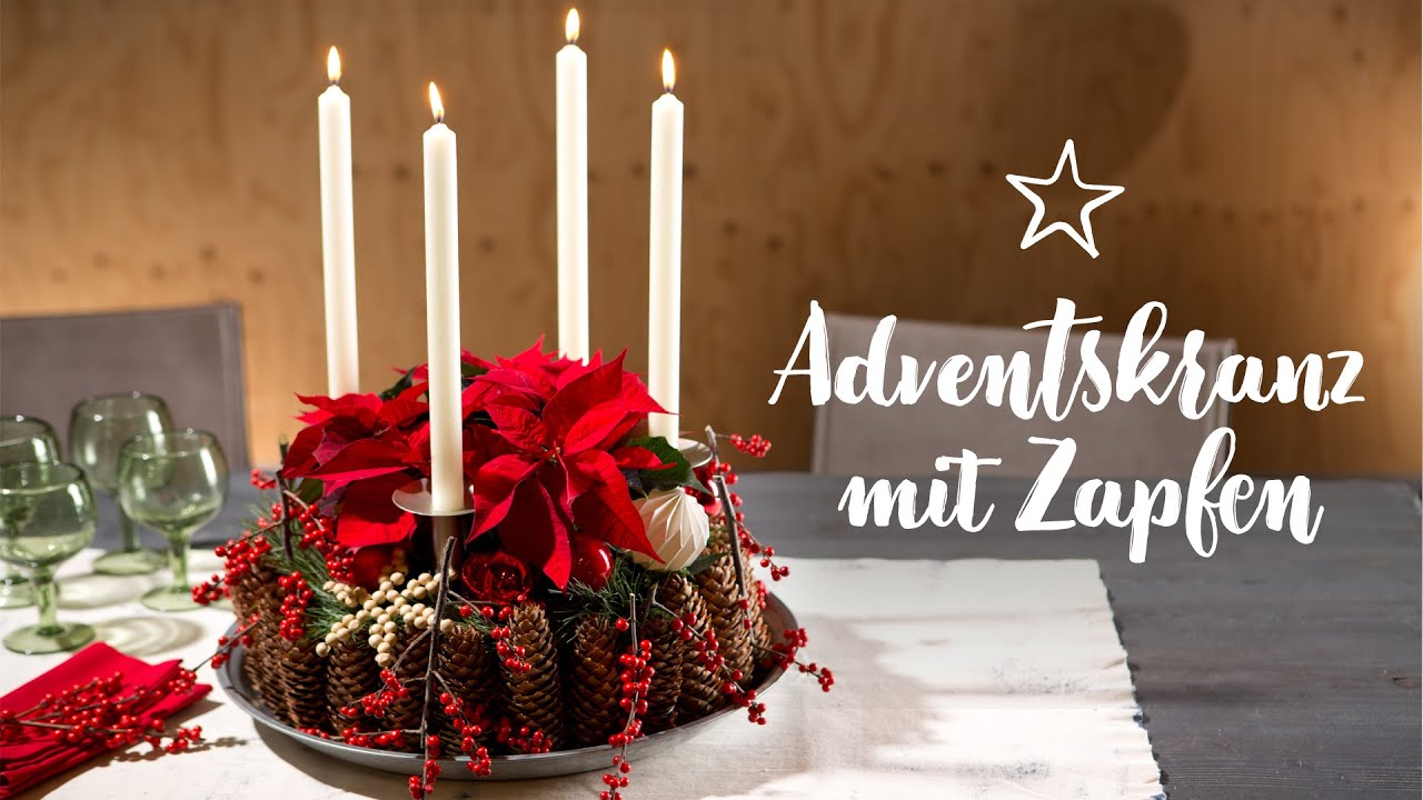 DIY: Adventskranz mit Zapfen und Weihnachtsstern