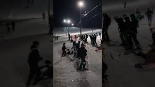 Skiers Scramble for the Uphill Lift