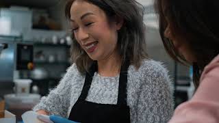 American Idol Myra Tran assembling macaron ice cream at Mavens Creamery with co-founder Gwen Nguyen