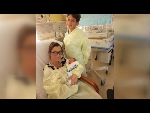 Boy delivers baby brother, saves mother's life
