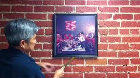 Security picture frame installation