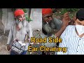 Roadside Ear Cleaning by Poor Barber