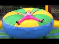 Outdoor Playground for children - we ride a roller coaster and jump on a trampoline