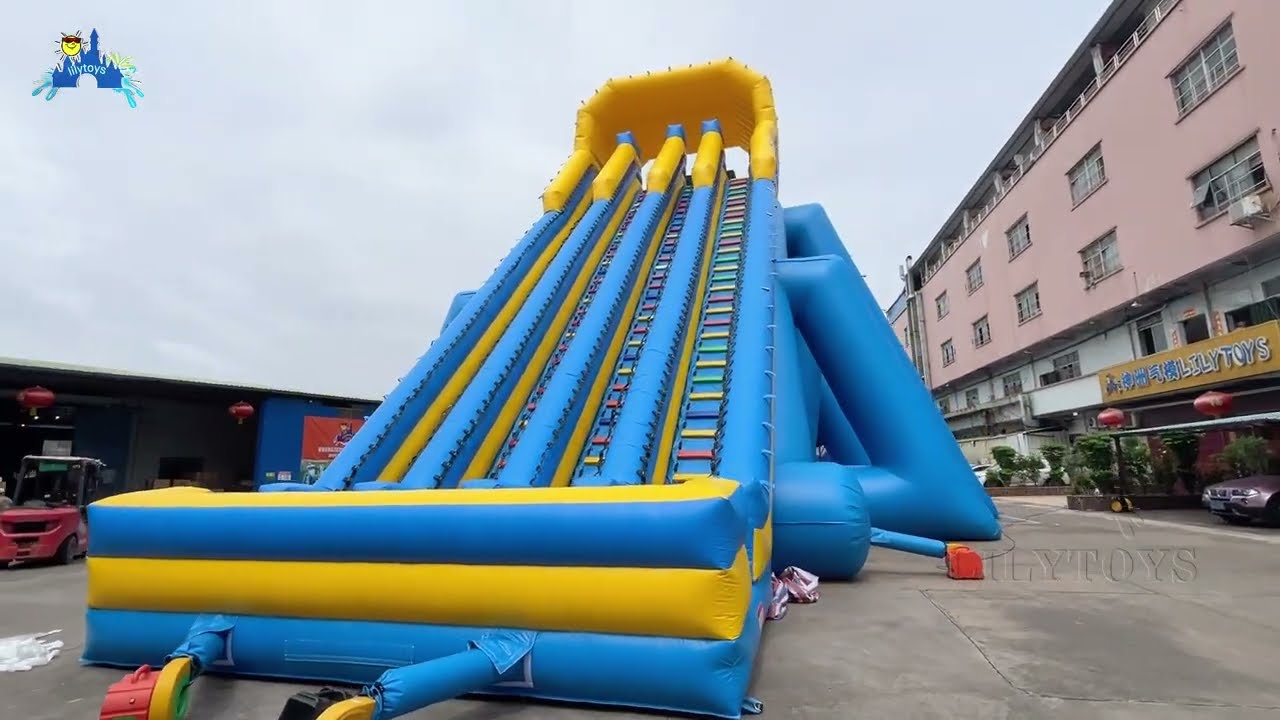Blue-Yellow Striped Extra-Long Inflatable Slide: Multi-Lane Racing for Fun Summer Water Play!