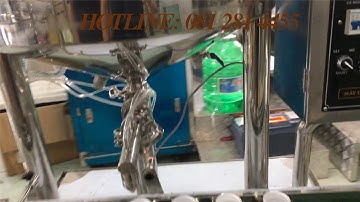 Máy chiết rót 1 vòi gia nhiệt có băng tải tự động dùng chiết dung dịch năng suất cao