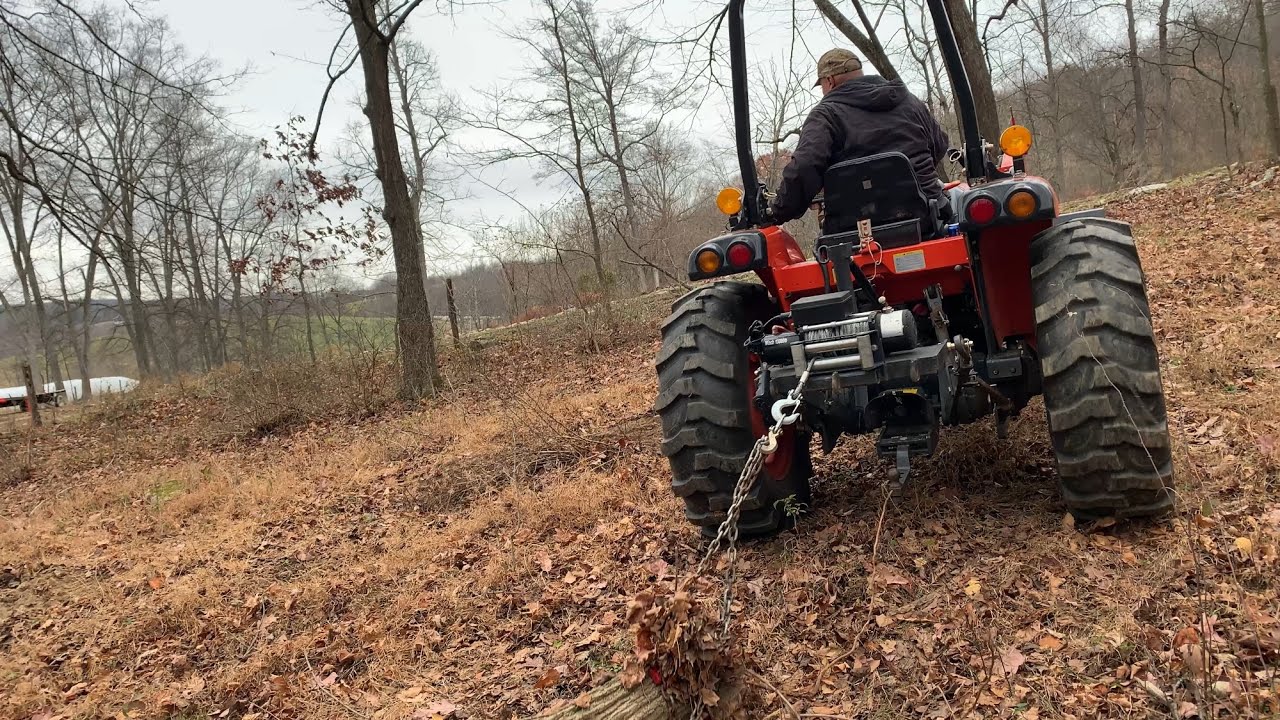 3 point log winch makes quick work of a hung up tree. - YouTube