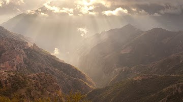 Sun Rays Passing Through Clouds Timelapse - Video Clip