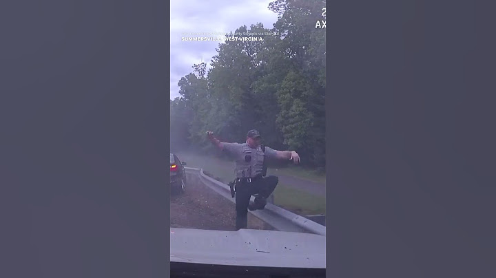 Dashcam video shows officer on side of road narrowly escape careening BMW #Shorts