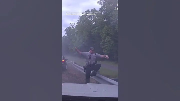 Dashcam video shows officer on side of road narrowly escape careening BMW #Shorts - DayDayNews