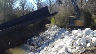 Using heavy equipment to fly a filter fabric kite