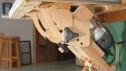 Tilting router lift design