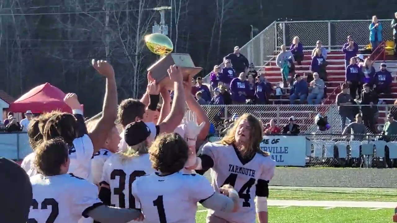 Yarmouth celebrates the large school 8-man state championship with a 30-26 win over Waterville